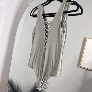 Olivaceous V Neck Bodysuit